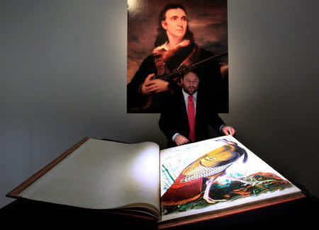 FILE PHOTO: A first edition of John James Audubon's "The Birds of America" is shown during a preview at Christie's auction house in New York, in this January 13, 2012 picture. REUTERS/Brendan McDermid/File Photo