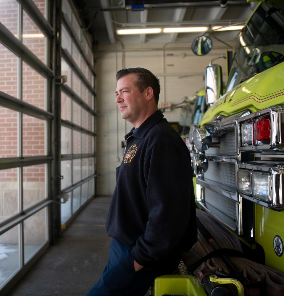 Kent Firefighter Pat Paisley stopped on his way home after his shift the morning of Jan. 17 to help a woman out of her car, which had become stuck in snow on railroad tracks, before it was struck by a train. Paisley at the Kent fire station on January 25.