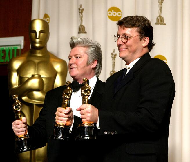Los Angeles, California- Richard Taylor, right, and Peter King won for Achievement in Make-up for "Lord of the Rings" at the 76th Annual Academy Awards at the Kodak Theatre in Los Angeles, Calif., Sunday, February 29, 2004. LOS ANGELES TIMES PHOTO BY FRANCINE ORR