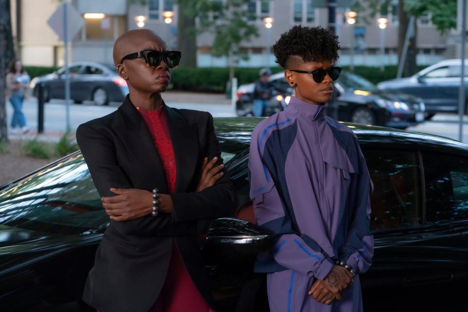 Okoye (Danai Gurira, left) and Shuri (Letitia Wright) go undercover to protect a teenage tech prodigy in "Black Panther: Wakanda Forever."