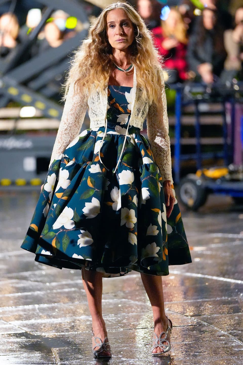 <p>Sarah Jessica Parker wore a classic Carrie Bradshaw silhouette in a voluminous dress and strappy heels, whilst filming with Mr Big. </p>