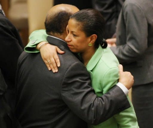 Abdurrahman Mohamed Shalgham (left), former Libyan permanant representative to the United Nations, is embraced by U.S. ambassador to the UN Susan Rice after the Security Council voted in favor of the resolution to impose a no-fly zone on Libya