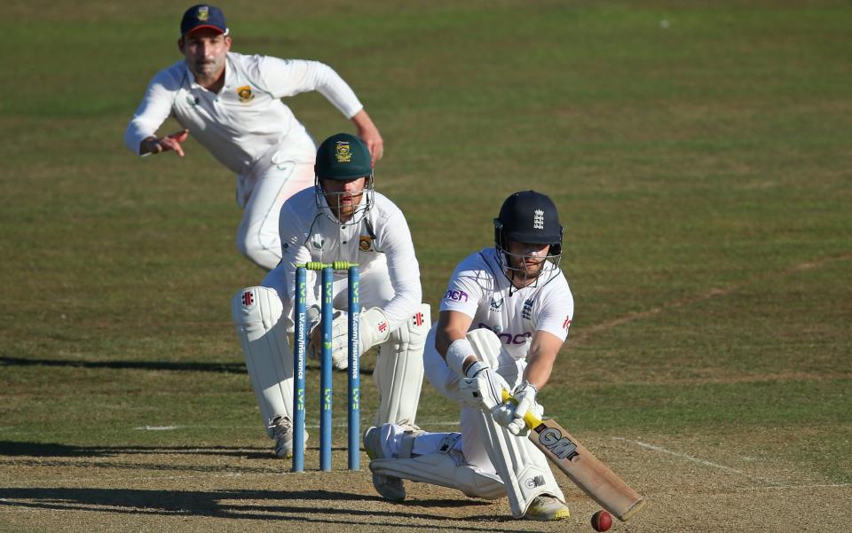 Ben Duckett of England Lions plays a sweep shot as Kyle Verreynne of South Africa looks on during day two of the tour match between England Lions and South Africa at The Spitfire Ground on August 10, 2022 in Canterbury, England. - Getty Images Europe 