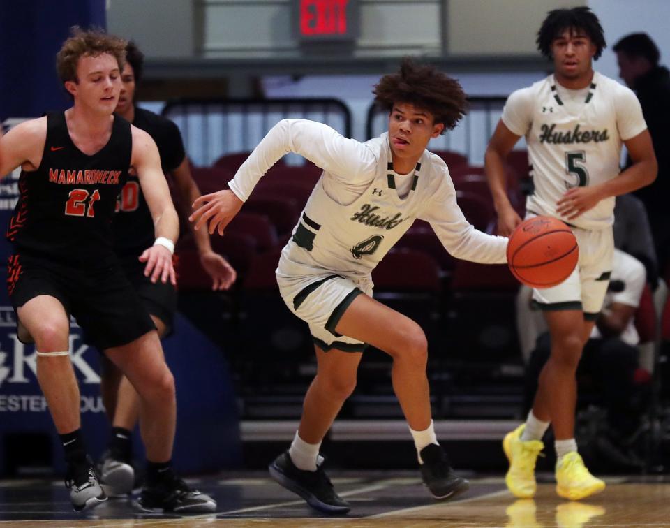 Mamaroneck defeated Kaden Gonzalez (0)and Yorktown 65-49 in the Slam Dunk Classic at the Westchester County Center in White Plains Jan. 5, 2024.