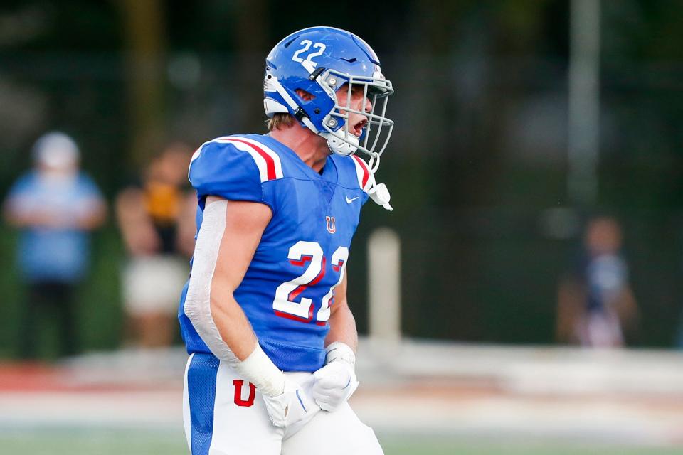 MUS’ Hudson Shoaf (22) celebrates making a stop during the game between Bartlett High School and Memphis University School at MUS in Memphis, Tenn., on Friday, August 18, 2023. MUS defeated Bartlett 37-0.