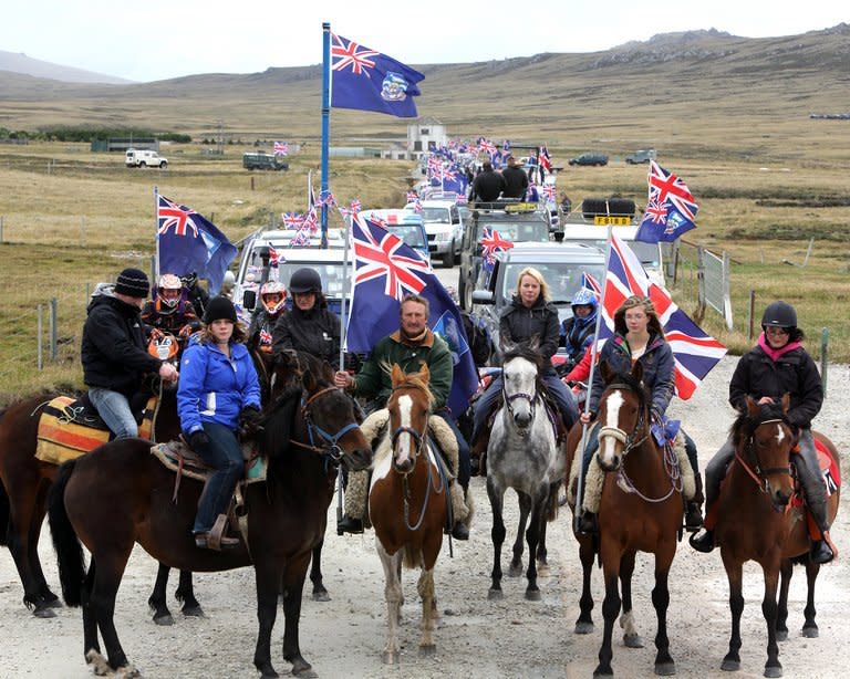 Islanders take part in the "Proud to be British" parade in Port Stanley, Falkland Islands, on March 10, 2013. Falkland Islanders have voted overwhelmingly in favour of remaining a British overseas territory in a referendum designed to send a strong message to Argentina, which earlier derided the poll as illegal