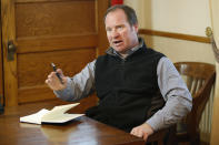 Dave Carlson, the reeve of Emerson-Franklin, speaks to media in his office in Emerson, Manitoba, Thursday, Jan. 20, 2022. A Florida man was charged Thursday with human smuggling after the bodies of four people, including a baby and a teen, were found in Canada near the U.S. border in what authorities believe was a failed crossing attempt during a freezing blizzard. The bodies were found Wednesday in the province of Manitoba just meters (yards) from the U.S. border near the community of Emerson. (John Woods/The Canadian Press via AP)