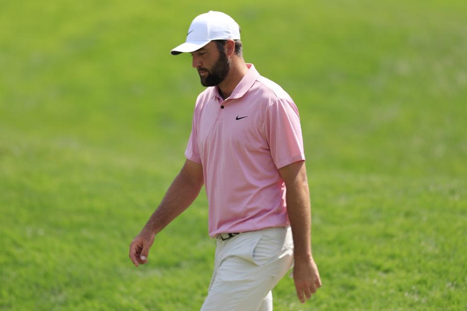 Defending Players champion Scottie Scheffler walks off his final hole on Friday following a 69 in the second round of The Players Championship.