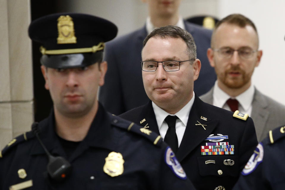 Army Lt. Col. Alexander Vindman, a military officer at the National Security Council, departs a closed door meeting after testifying as part of the House impeachment inquiry into President Donald Trump, Tuesday, Oct. 29, 2019, on Capitol Hill in Washington. (AP Photo/Patrick Semansky)