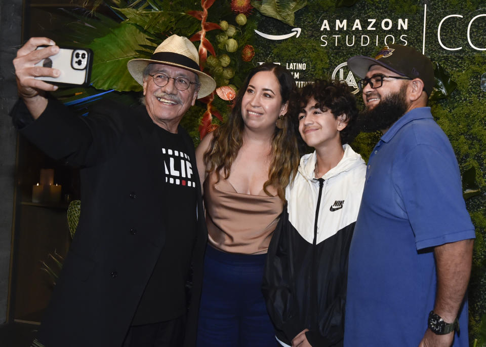 HOLLYWOOD, CALIFORNIA - OCTOBER 03: Edward James Olmos (L) takes selfie with student and family at Amazon Studies and Latin Film Institute event celebrating Latino heritage & culture at NeueHouse Hollywood on October 03, 2022 in Hollywood, California. (Photo by Rodin Eckenroth/Getty Images)