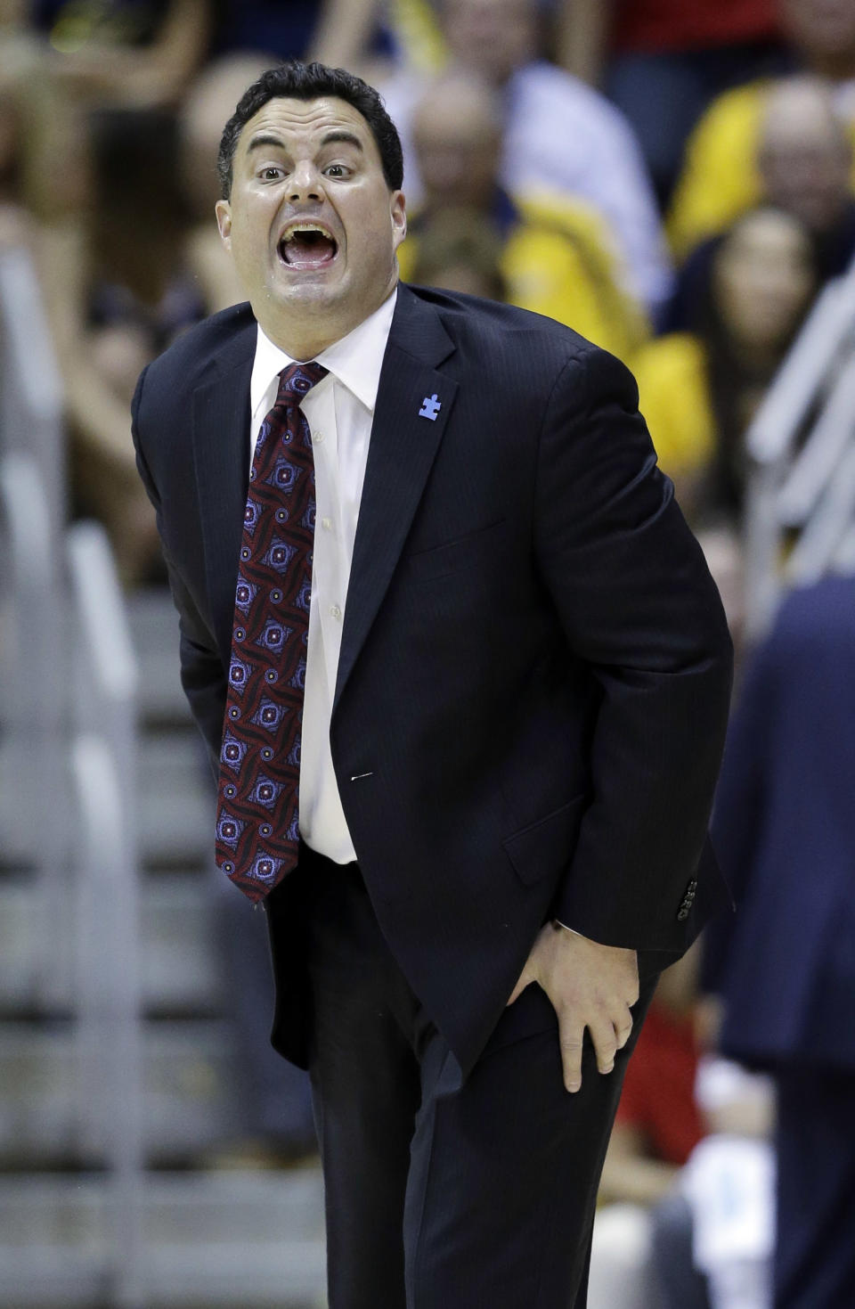 Arizona head coach Sean Miller instructs his team against California during the first half on an NCAA college basketball game on Saturday, Feb. 1, 2014, in Berkeley, Calif. (AP Photo/Marcio Jose Sanchez)