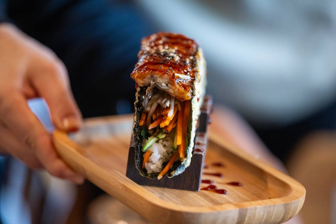 An Unagi Taco, $12, with grilled eel, apple, carrot, cucumber and unagi sauce is served at the newly opened Engawa Fusion restaurant on Stockton Boulevard in south Sacramento on Saturday, May 4, 2024.
