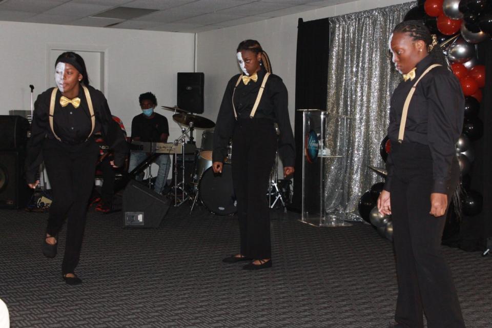 The elder group of The Atmosphere Shifters liturgical dance troupe perform during the service.