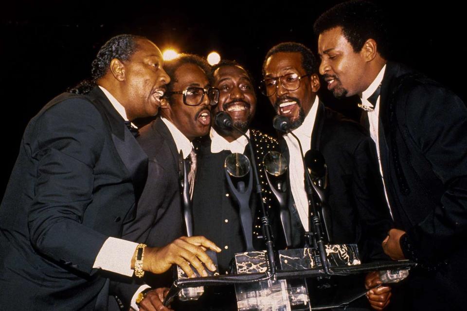<p>Sonia Moskowitz/IMAGES/Getty</p> The Temptations, photographed in 1989, appear at the Rock & Roll Hall of Fame Induction Ceremony in New York City