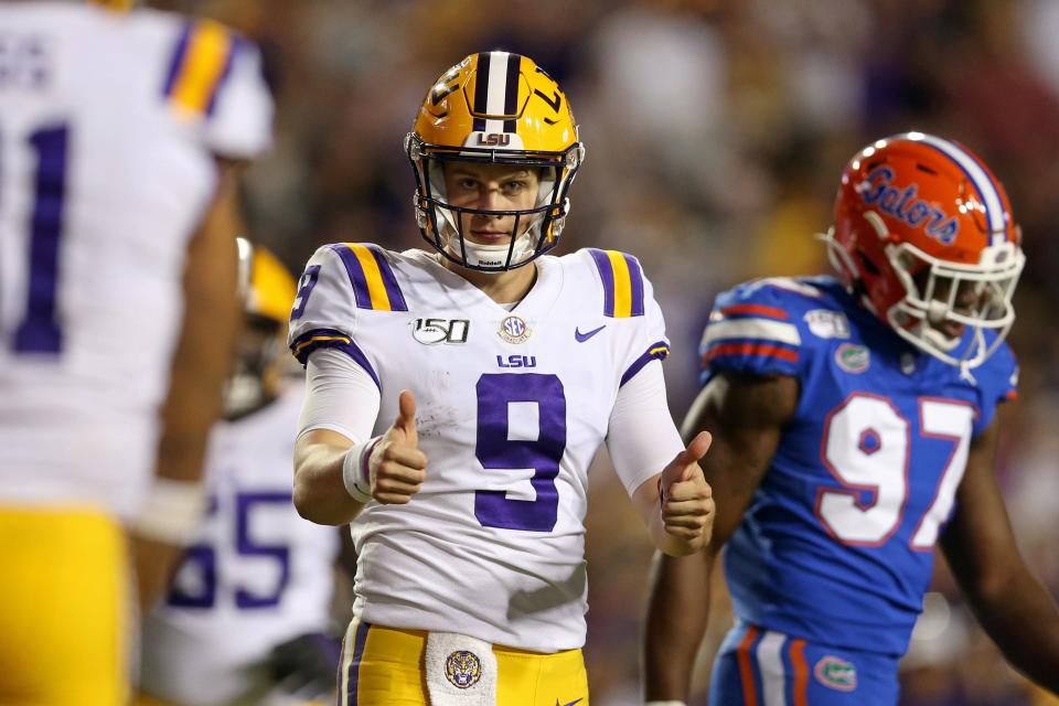 LSU Tigers quarterback Joe Burrow (9) gestures after a touchdown against the Florida Gators.