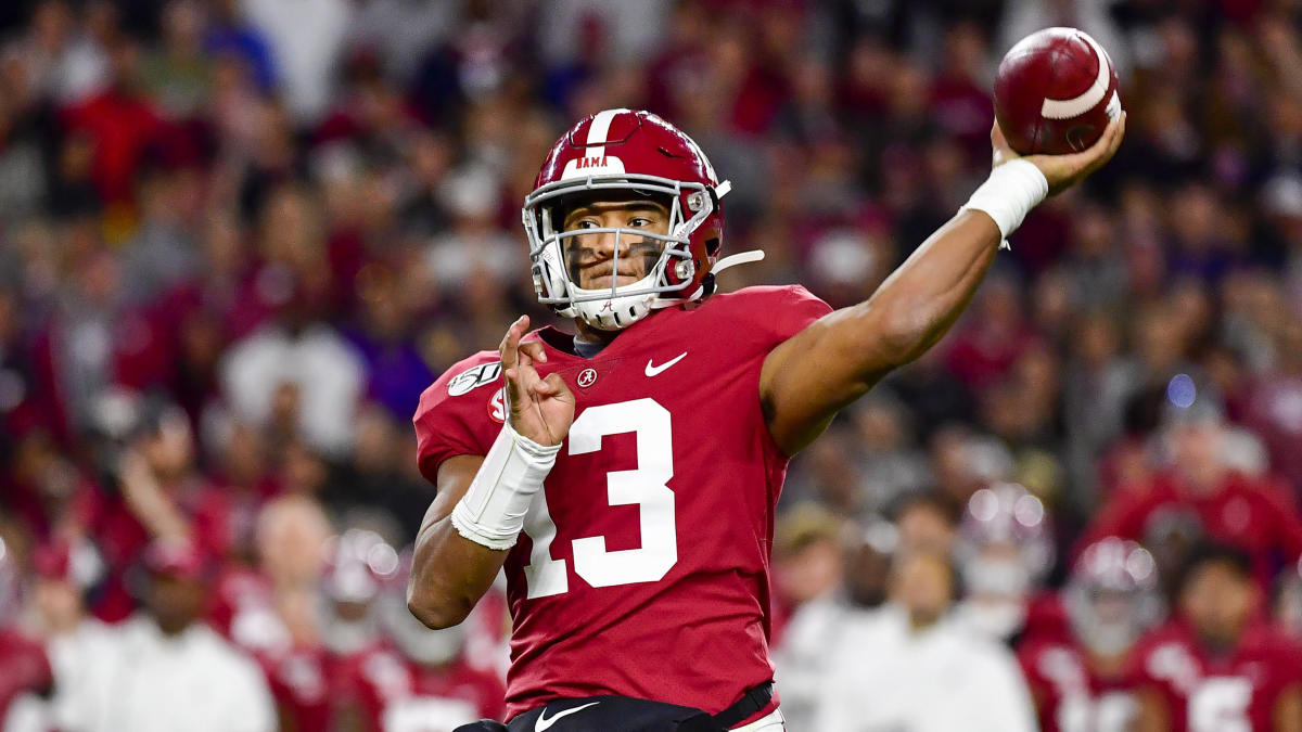 FILE - In this Jan. 1, 2020, file photo, Alabama quarterback Mac Jones (10)  rolls ut as he looks for a receiver during the first half of the Citrus  Bowl NCAA college