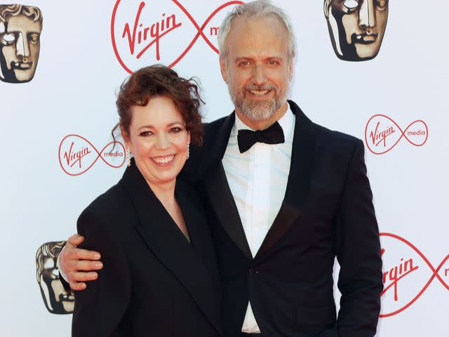 <p>Mike Marsland/WireImage</p> Olivia Colman and Ed Sinclair attend the Virgin Media British Academy Television Awards on May 08, 2022 in London, England.