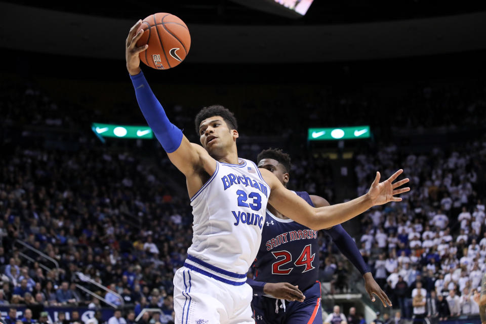 Jan 24, 2019; Provo, UT, USA; Brigham Young Cougars forward Yoeli Childs (23) grabs an offensive rebound away from St. Mary's Gaels forward Malik Fitts (24) during the second half at Marriott Center. Mandatory Credit: Chris Nicoll-USA TODAY Sports