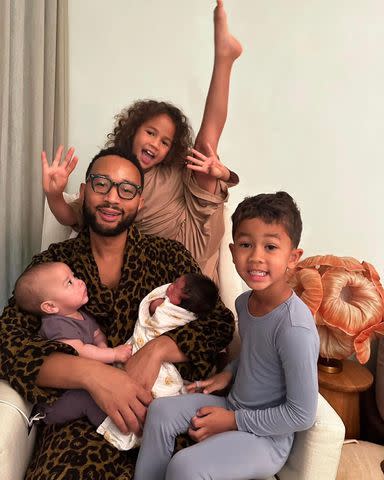 <p>John Legend Instagram</p> John Legend with all four kids