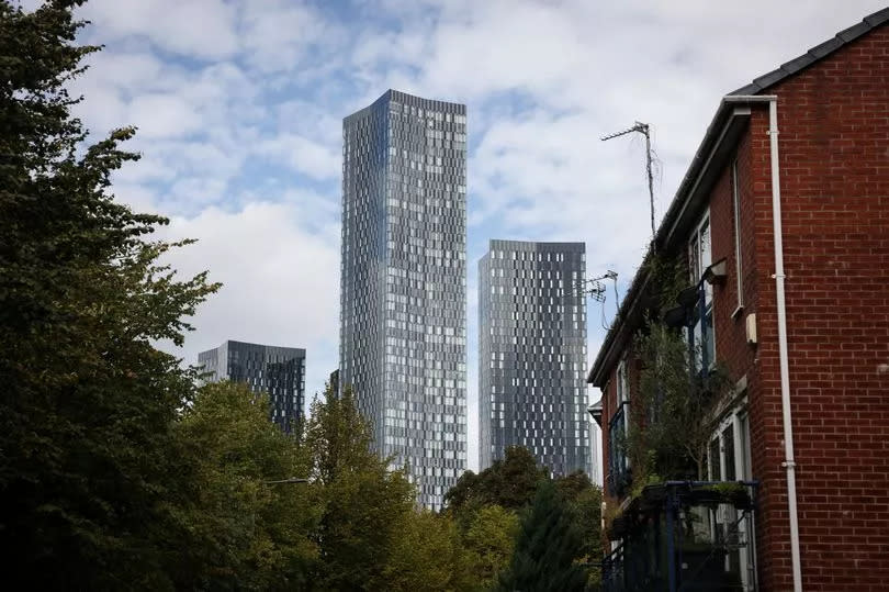 The city's tallest towers loom over Hulme -Credit:Manchester Evening News