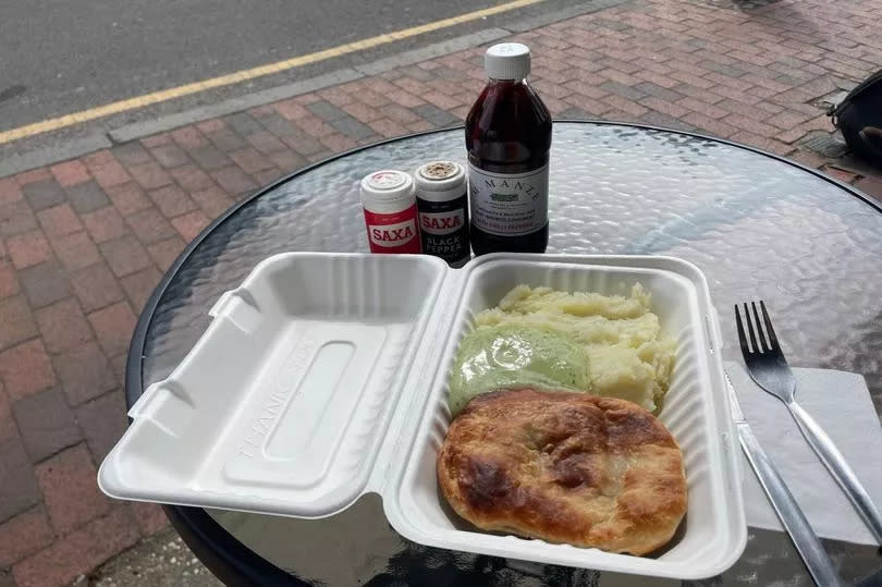 The mighty pie and mash, with green liquor at Whippet in Camden Road in Tunbridge Wells - it is in a white box on a table on the pavement
