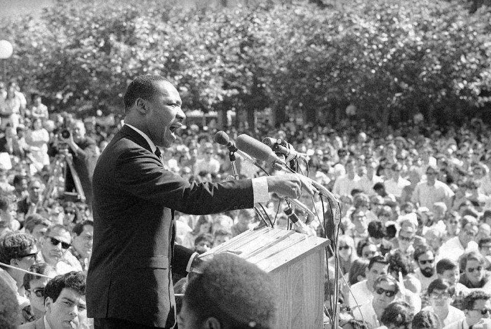 FILE - In this May 17, 1967 file photo, Dr. Martin Luther King speaks at the University of California administration building in Berkeley, Calif. Fifty years ago, Martin Luther King Jr. asked Americans, "Where do we go from here?" His warning of chaos or community squarely confronted racism, and marked a shift from his emphasis on nonviolence to a demand for full economic and political equality. Younger generations of black activists say they prefer the pointed, more forceful King to the Nobel Peace Prize-winning pacifist who preached love over hate. (AP Photo, File)