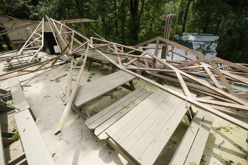 Rubble remains of the Ridge, a pavilion used by members of Parkview Church of God, after a direct hit by a tornado, Monday, May 3, 2021, in Yazoo County, Miss. A spate of tornadoes hit communities throughout the state on Sunday. (AP Photo/Rogelio V. Solis)