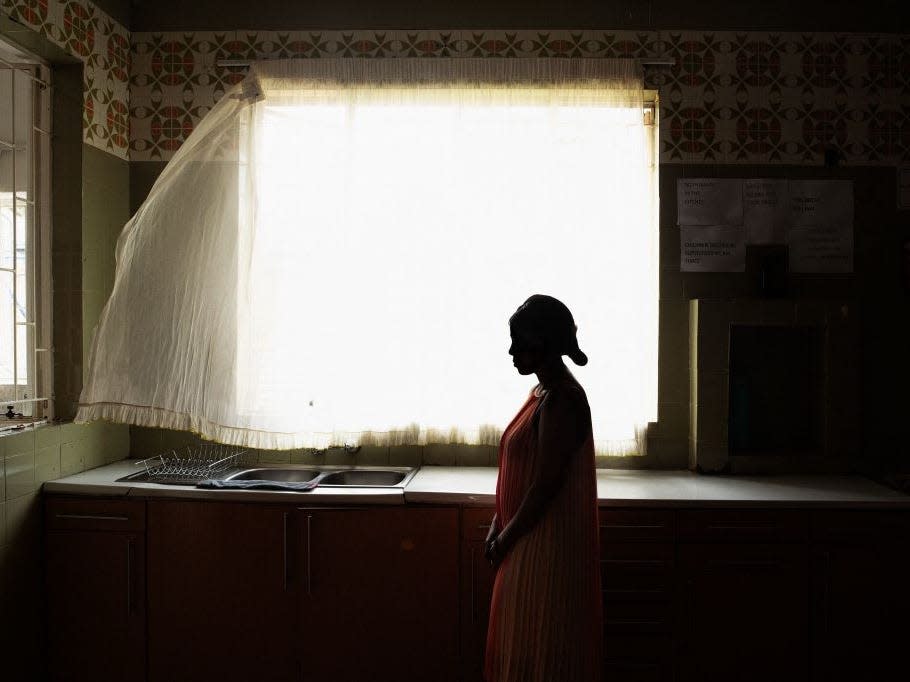 woman shadows domestic violence shelter