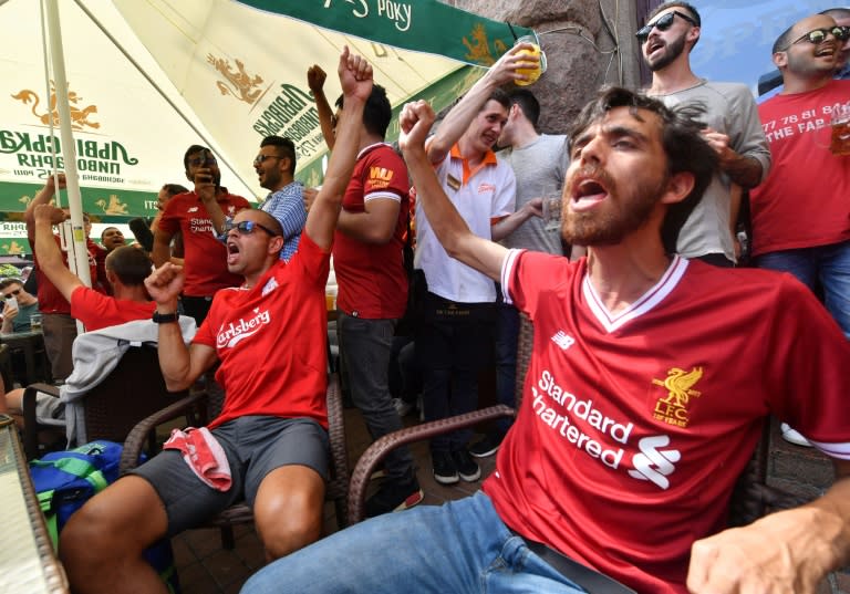 Liverpool fans get into the mood in central Kiev -- but many have found hotels have massively hiked prices for the final