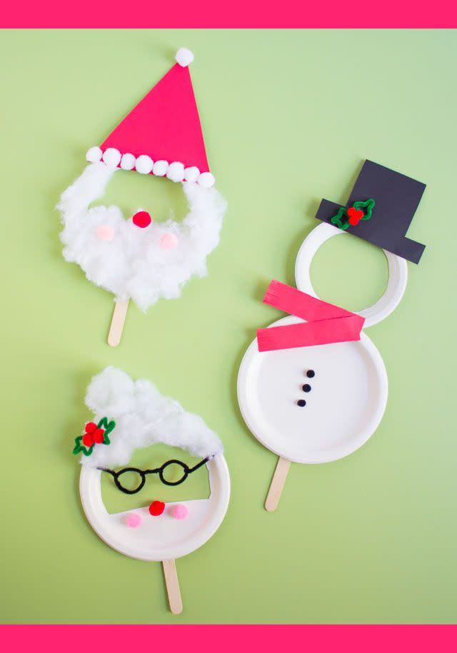 <p>Ordinary white paper plates and a few simple craft supplies are all kids need to whip up this adorable holiday project. Don’t forget to take tons of pictures of the little artists sporting their snowman, Santa Claus, and Mrs. Claus masks.</p><p><em><a href="https://designimprovised.com/2018/12/kids-week-paper-plate-christmas-masks.html" rel="nofollow noopener" target="_blank" data-ylk="slk:Get the tutorial at Design Improvised »;elm:context_link;itc:0;sec:content-canvas" class="link ">Get the tutorial at Design Improvised »</a></em></p>