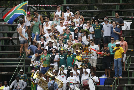 Fans sing during the third cricket test match between South Africa and England in Johannesburg, South Africa, January 14, 2016. REUTERS/Siphiwe Sibeko