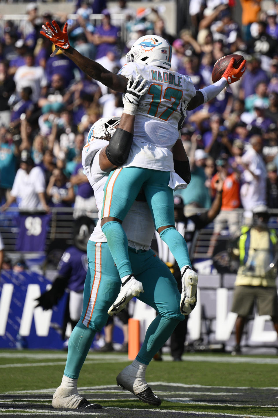 Miami Dolphins wide receiver Jaylen Waddle (17) celebrates after a touchdown during the second half of an NFL football game against the Baltimore Ravens, Sunday, Sept. 18, 2022, in Baltimore. (AP Photo/Nick Wass)