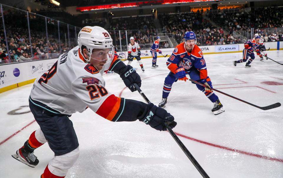 Jesper Froden passes to an open teammate for the Coachella Valley Firebirds against Bakersfield in Palm Desert, Calif., Jan. 13, 2023. 