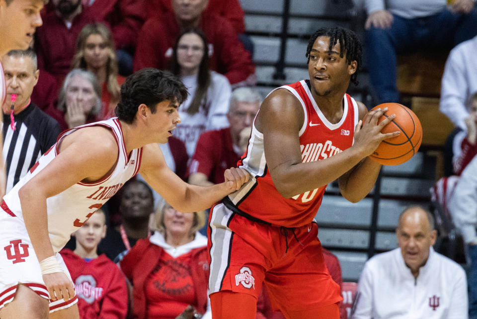 Ohio State forward Brice Sensabaugh holds the ball while Indiana guard Trey Galloway defends in the first half of their men&#39;s college basketball game at Simon Skjodt Assembly Hall in Bloomington, Indiana, on Jan. 28, 2023. (Trevor Ruszkowski/USA TODAY Sports)