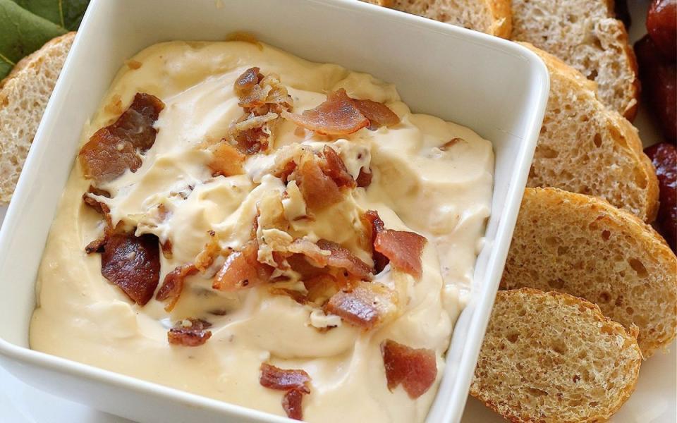 <p>Genelle Taylor</p><p>Grab some crackers and a sliced baguette because this smoky, cheesy heaven is waiting!</p><p><strong>Get the recipe: <a href="https://parade.com/1099320/parade/bacon-cheese-dip/" rel="nofollow noopener" target="_blank" data-ylk="slk:Bacon Cheese Dip;elm:context_link;itc:0;sec:content-canvas" class="link ">Bacon Cheese Dip</a></strong></p><p><strong>Related: <a href="https://www.yahoo.com/lifestyle/90-super-bowl-worthy-dips-223419416.html" data-ylk="slk:90 Super Bowl-Worthy Dips;elm:context_link;itc:0;sec:content-canvas;outcm:mb_qualified_link;_E:mb_qualified_link;ct:story;" class="link  yahoo-link">90 Super Bowl-Worthy Dips</a></strong></p>