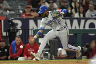 Kansas City Royals third baseman Maikel Garcia fields a ball hit by Los Angeles Angels' Zach Neto during the seventh inning of a baseball game Thursday, May 9, 2024, in Anaheim, Calif. Neto was safe at first on the play. (AP Photo/Mark J. Terrill)