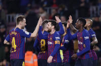 FC Barcelona's Dembele, right, celebrates after scoring with teammates his side's second goal during a Spanish Copa del Rey soccer match between FC Barcelona and Levante at the Camp Nou stadium in Barcelona, Spain, Thursday, Jan. 17, 2019. (AP Photo/Manu Fernandez)