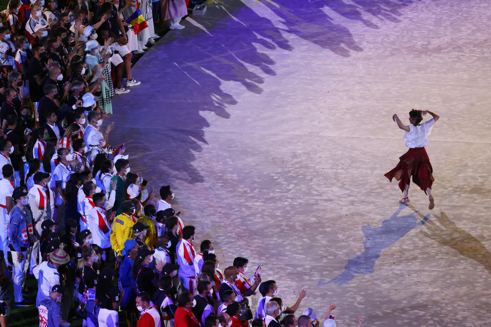 <p>Team members watch performers during the Closing Ceremony of the Tokyo 2020 Olympic Games at Olympic Stadium on August 08, 2021 in Tokyo, Japan. (Photo by Steph Chambers/Getty Images)</p> 