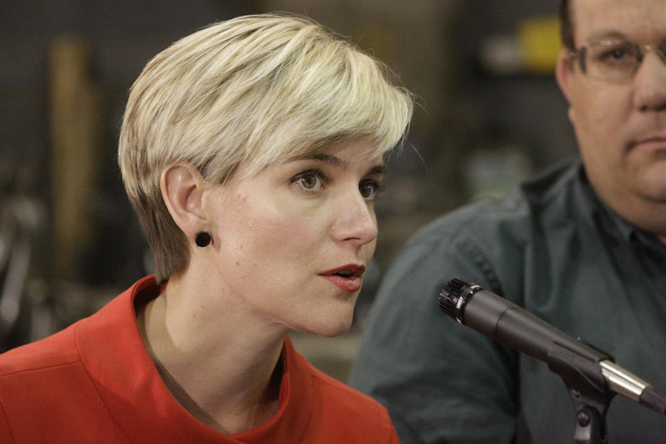 File - In this May 19. 2016, file photo, Illinois Rep. Sara Wojcicki Jimenez, R-Springfield, speaks during a town hall meeting with Illinois Gov. Bruce Rauner and local community leaders in Springfield, Ill. As the #MeToo movement against sexual misconduct began snaring politicians, state legislatures across the country vowed to re-examine their policies to prevent harassment and beef up investigations into complaints of sexual wrongdoing. (AP Photo/Seth Perlman, File)