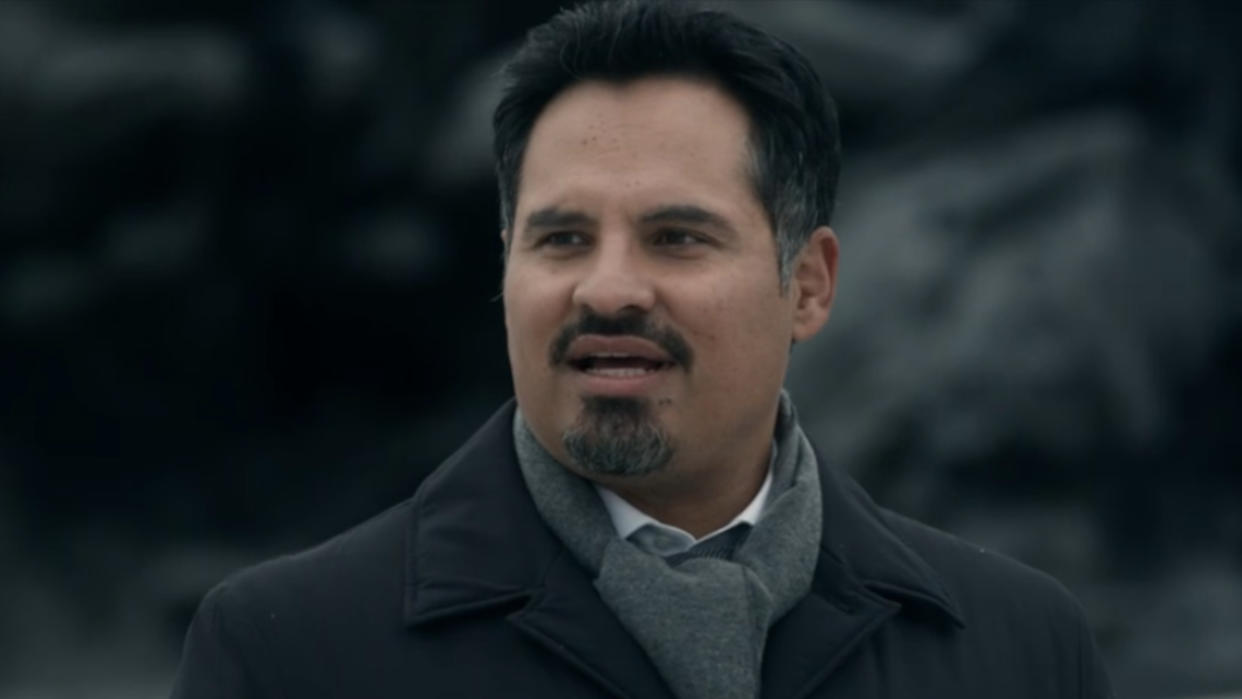  Michael Peña talking outside, while dressed for cold weather, in Tom Clancy's Jack Ryan. 