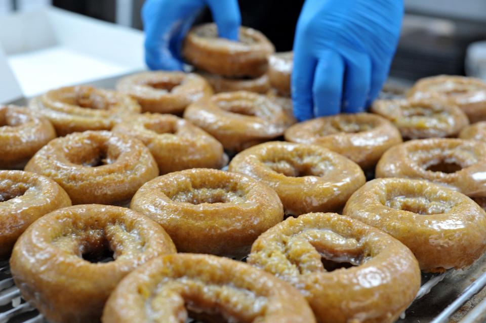 Each year, Cinotti's Bakery in Jacksonville Beach makes about 1,000 dozen of its signature pumpkin doughnuts for its midnight release party and first full day of sales.