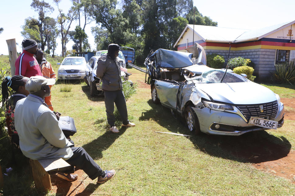 The wreckage of the vehicle in which world marathon record holder Kelvin Kiptum and his Rwandese coach, Garvais Hakizimana, were traveling in before they were involved Sunday night in a fatal road crash, is brought at Kaptabat police station, near Eldoret, Kenya, Monday, Feb. 12, 2024. According to Kenyan police, Kiptum was driving the sedan when he lost control and crashed along a road in Uasin Gishu county on their way to his training camp in Kapsabet, western Kenya, killing him and Hakizimana on the spot. (AP Photo)