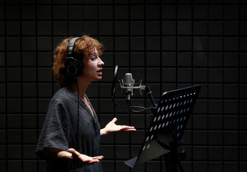 Belarusian electro-folk singer Shukiurava works at a recording studio in Kyiv