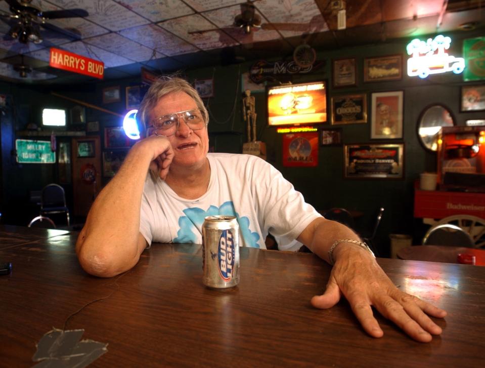Harry Hammonds, the former owner of Harry's Bar, sits on a stool in the bar in this 2004 file photo.