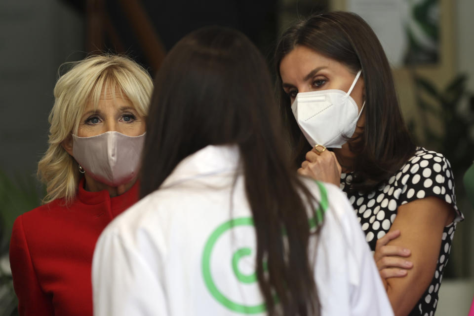 U.S. first lady Jill Biden, left, and Spain's Queen Letizia, right, visit the Spanish Association Against Cancer center ahead of the NATO Summit, in Madrid, Spain, Monday June 27, 2022. (Nacho Doce/Pool Photo via AP)