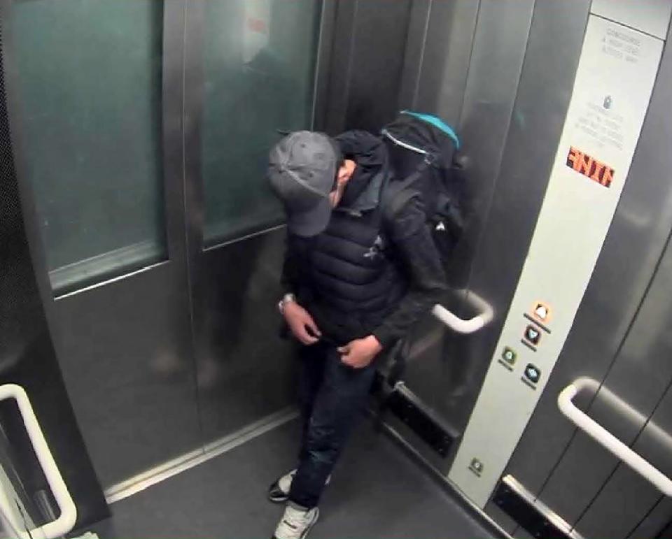 Salman Abedi adjusting wiring underneath his clothing as he carries his suicide bomb in a lift at Manchester Arena shortly before the attack on 22 May 2017Manchester Arena Inquiry