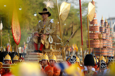 Thailand's newly crowned King Maha Vajiralongkorn and Queen Suthida are seen during the coronation procession, in Bangkok, Thailand May 5, 2019. REUTERS/Navesh Chitrakar