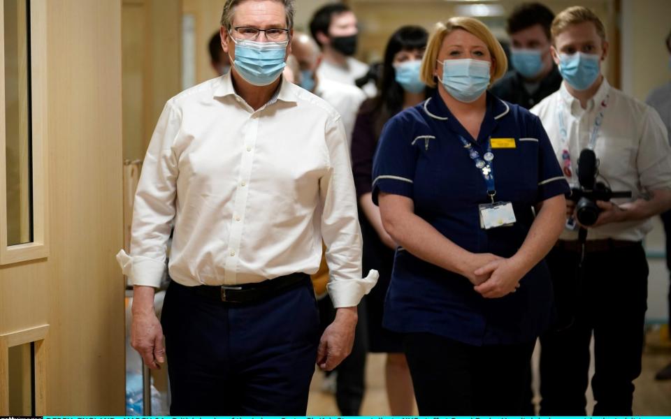 Keir Starmer talks to NHS staff at Royal Derby Hospital during a post-Budget visit - Getty