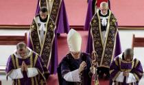 French Bishop Jean-Michel Faure (C) walks during a mass in Nova Friburgo near Rio de Janeiro March 28, 2015. REUTERS/Stephen Eisenhammer