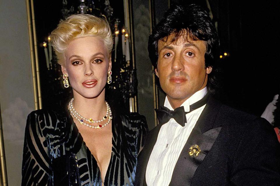 <p>Jim Smeal/Ron Galella Collection via Getty</p> Brigitte Nielsen with ex-husband Sylvester Stallone